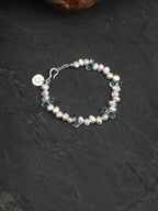 LUCENT RIPPLE · Blue Topaz & Pearl Bracelet
