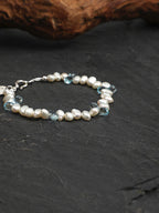 LUCENT RIPPLE · Blue Topaz & Pearl Bracelet